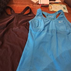 Pair of Nike drift tops